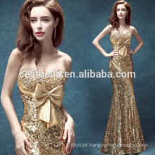Goldene Meerjungfrau Boden-Lengh Celebrity Abendkleider mit Big Bow Weihnachten Formal Party Gown Golden